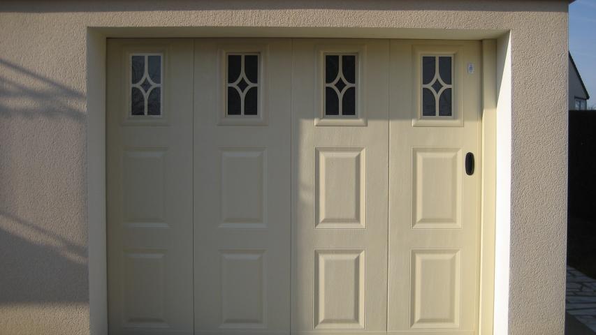 Porte sectionnelle latérale - Isolation Service