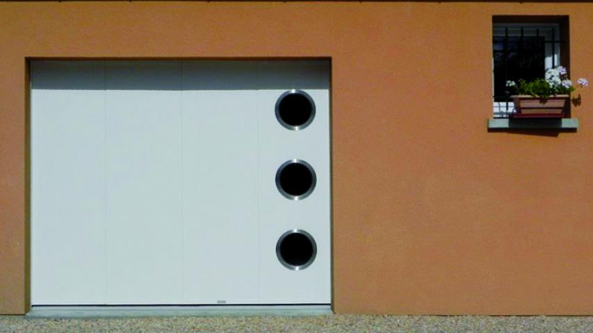 Porte sectionnelle latérale - Isolation Service